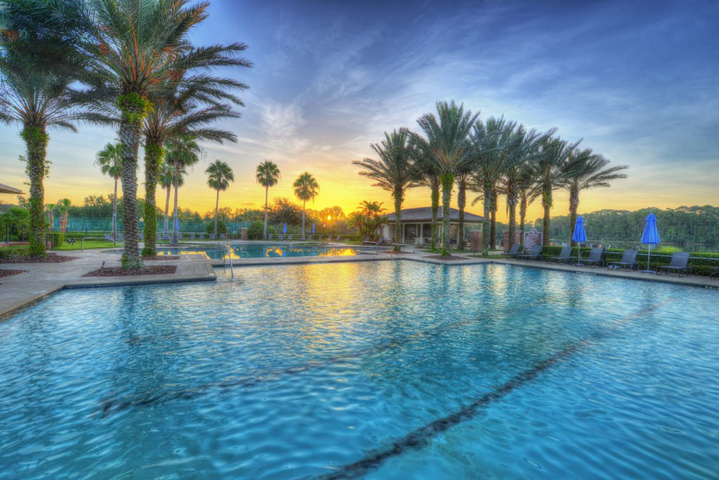 The two pools at Plantation Bay during a beautiful sunset
