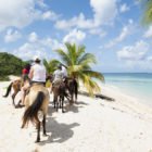 Where Plantation Bay Residents Go Horseback Riding on the Beach